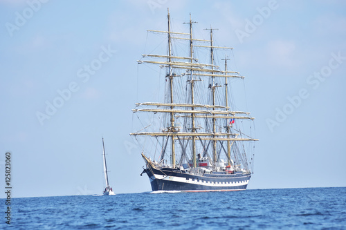 Tall ship regatta in a open sea.