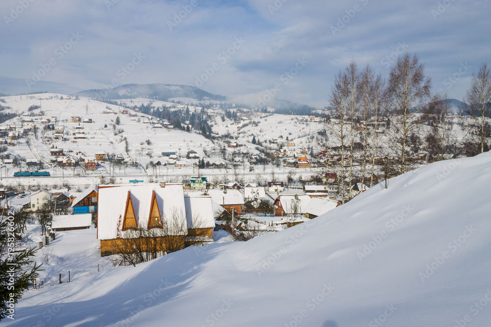 winter village landscape in Carpathian mountains