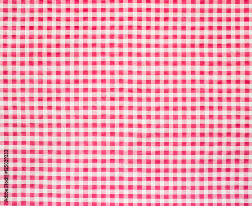 Red and white gingham tablecloth texture background.