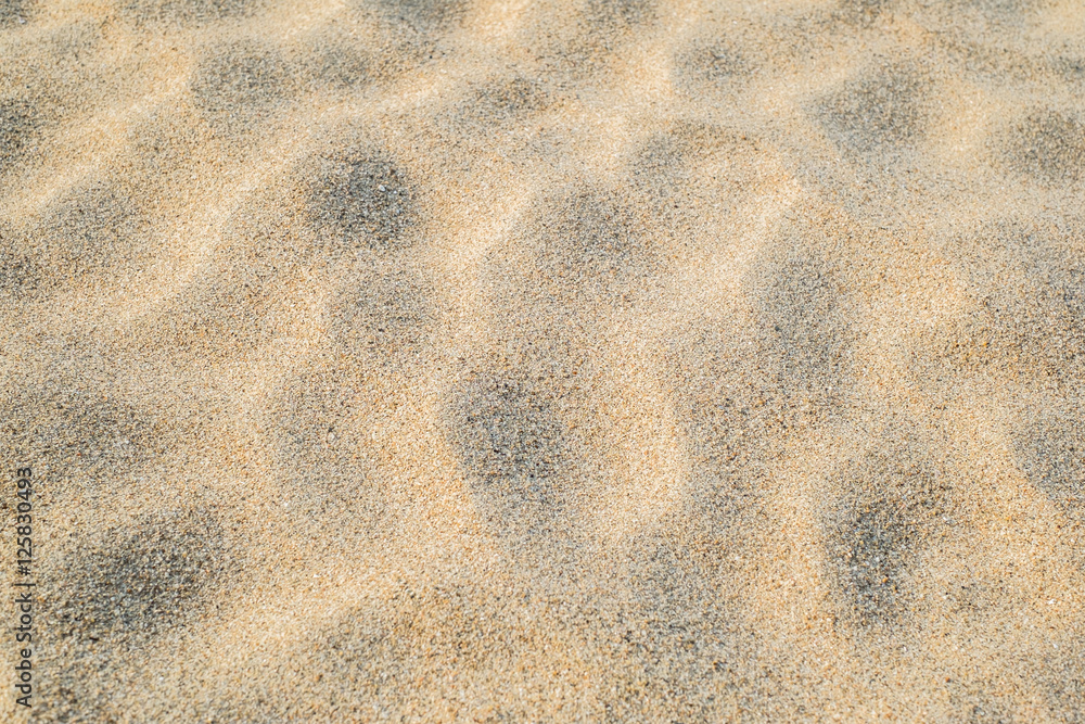 Sand pattern of a beach in the summer Sand pattern of a beach in the summer