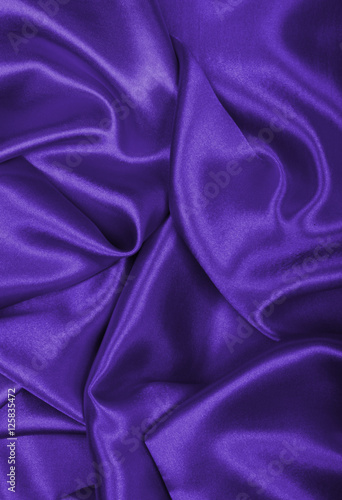 Smooth elegant lilac silk or satin texture as background