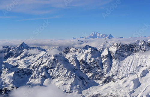 Winter panorama of the high Alps against the background of the m © Alex Serebrennikov