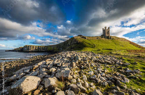 Dunstanburgh Castle remains, Northumberland, England photo