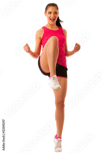 Active woman doing aerobics for a cardio training dancing