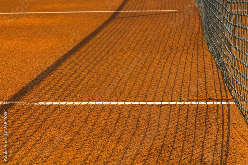      Empty red clay tennis court   © zlatkozalec