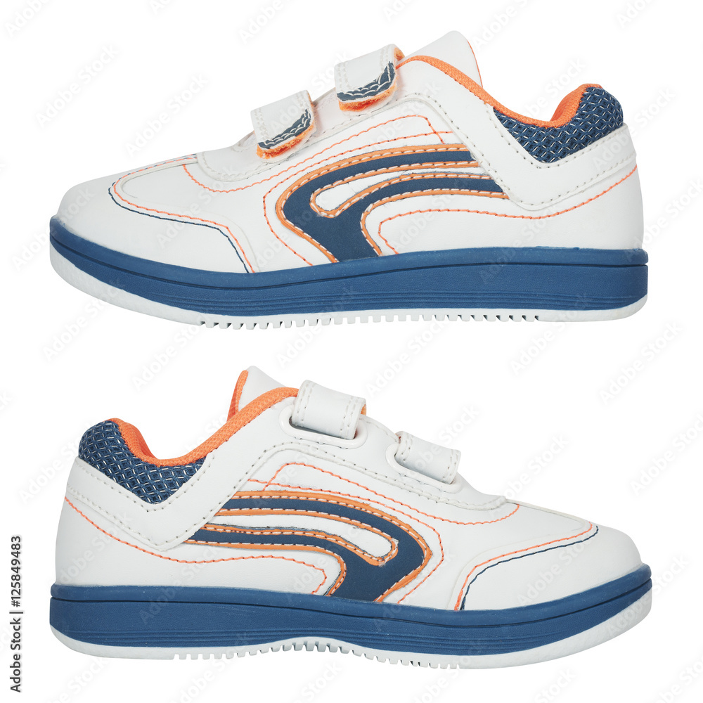 white kids sneakers isolated on white white kids sneakers isolated on white