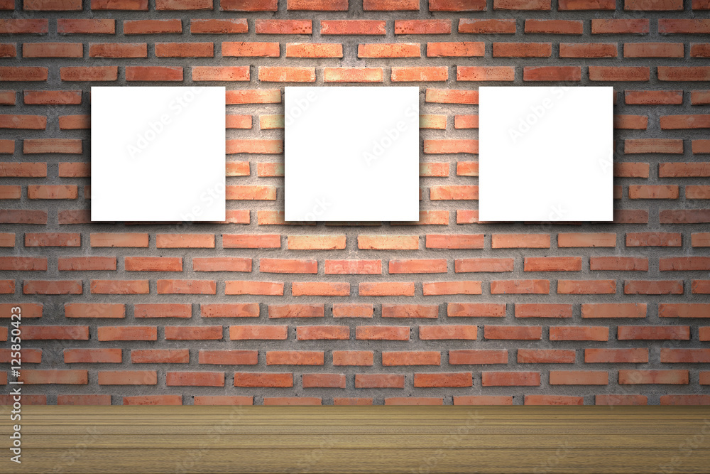 Empty wood table with Three canvas frame on red brick wall background.  product display template. Business presentation.Three empty frames in a  room against a red brick wall Stock Photo | Adobe Stock