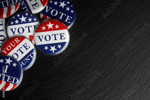 Red, white, and blue vote buttons background