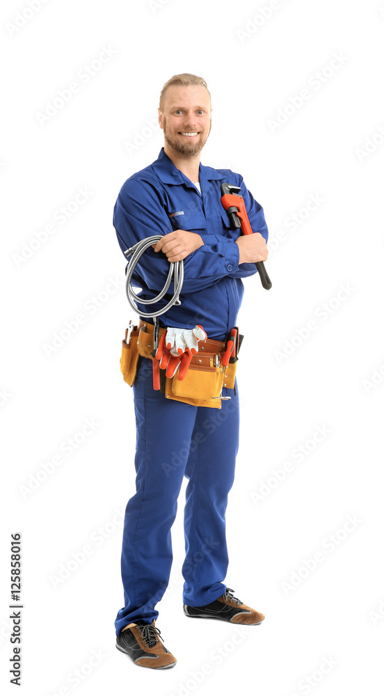 Handsome plumber with pipe wrench and flexible hose isolated on white Handsome plumber with pipe wrench and flexible hose isolated on white