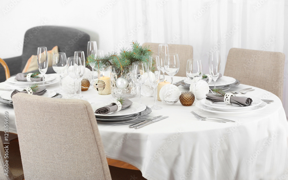 Table served for Christmas dinner in living room Table served for Christmas dinner in living room