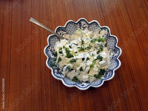 Yogurt cucumber cajik raita photo