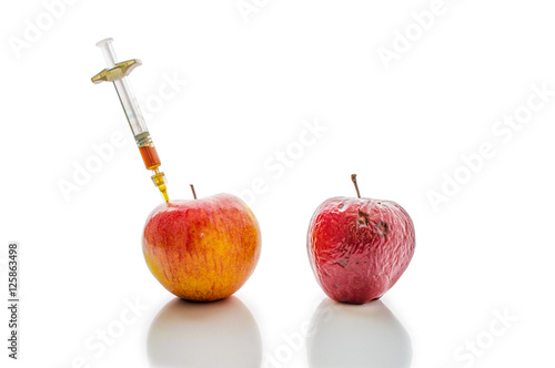 Fresh and old apple. As the concept of rejuvenation.