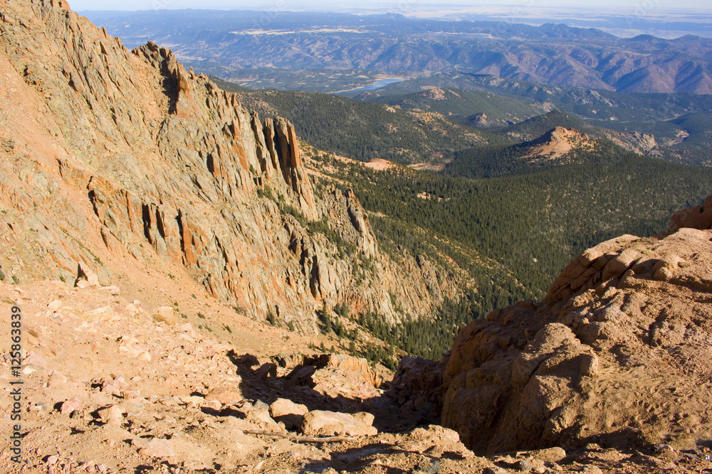 Rugged canyon on Pikes Peak with the Catamounts and Crystal Reservoir in the background