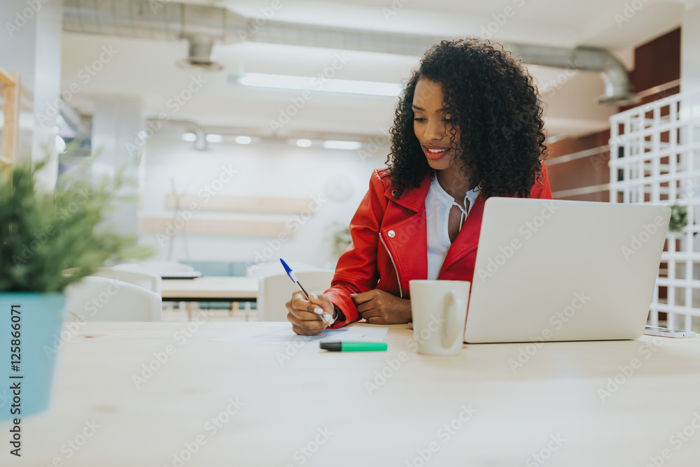 Black business woman working in the office. Black business woman working in the office.