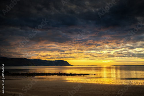 Dramatic sunset over West Shore at Llandudno. 