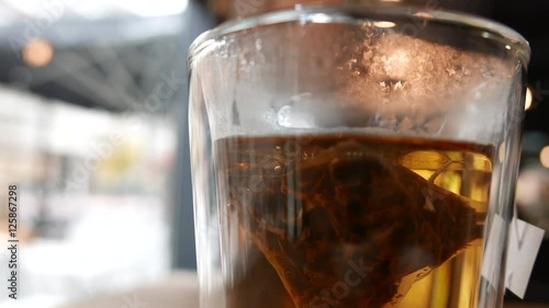 hot tea close up, teabag and steam