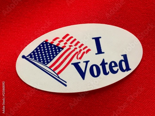 "I voted" sticker on red fabric