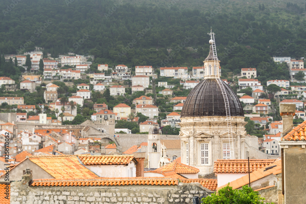 Overlooking the terracotta rooftops and the dome of the Church of St. Blaise, the patron saint of Dubrovnik, in the old town.
