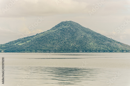 Momotombo and Momotombito volcanoes across Lake Managua photo
