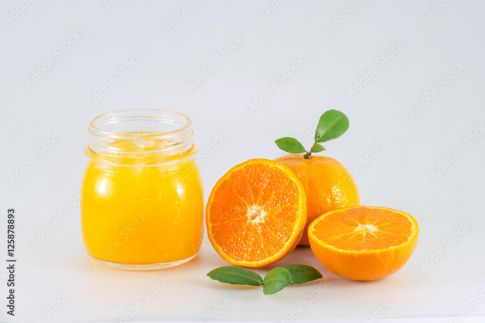 Orange juice and slices of orange isolated on white Orange juice and slices of orange isolated on white