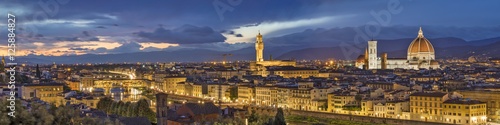golden panorama of night Florence in Italy © sergejson