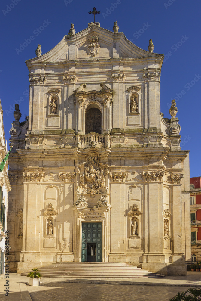 Martina Franca town, Apulia. The facade of St. Martin's Basilica at the Piazza Plebiscito, Taranto province, Apulia in South Italy.Eminent symbol of the Rococo Martina,