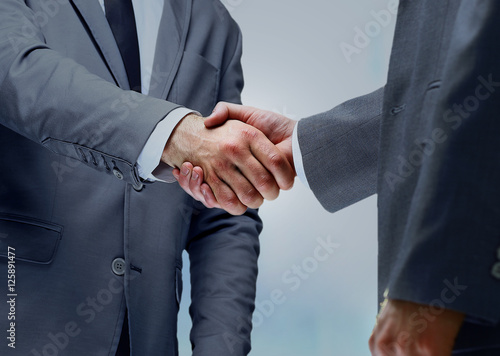 Handshake between two caucasian businessman