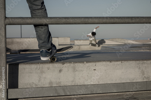 skate park with skateboarders