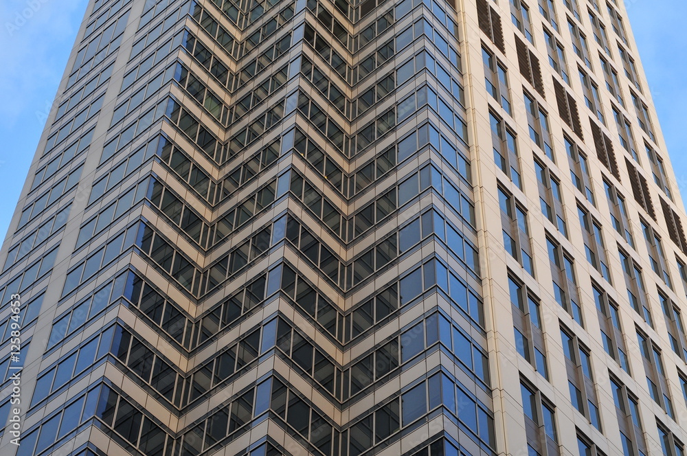 Glass pattern on skyscraper exterior wall.