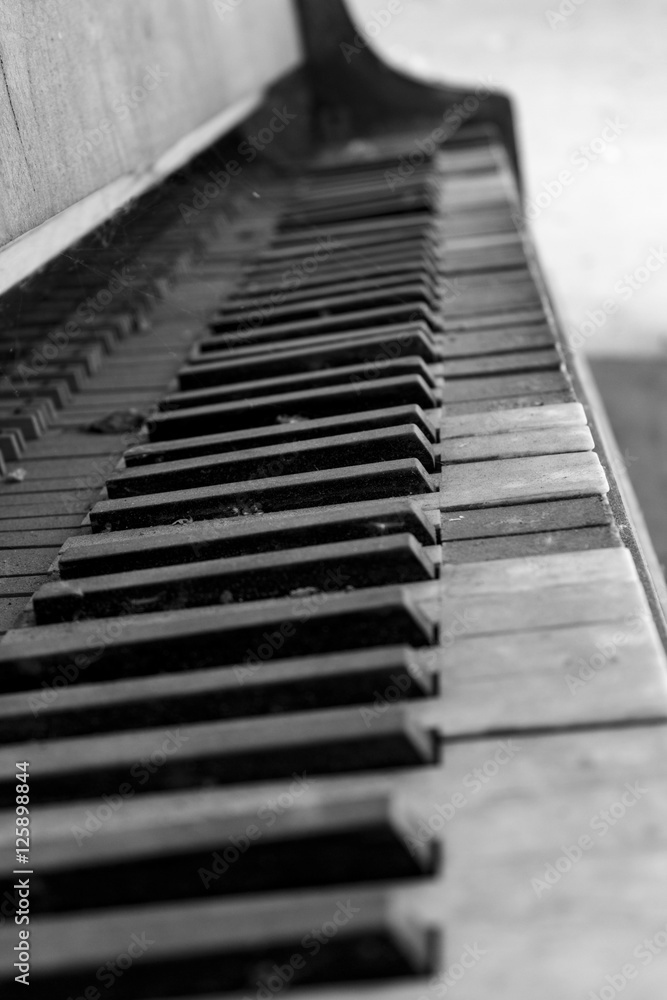 Black and white photo of destroyed old piano in an abandoned castle Black and white photo of destroyed old piano in an abandoned castle