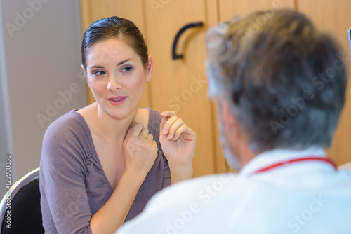 Female patient questioning doctor