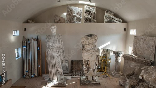 Wide dolly shot of various Greek Statues photo