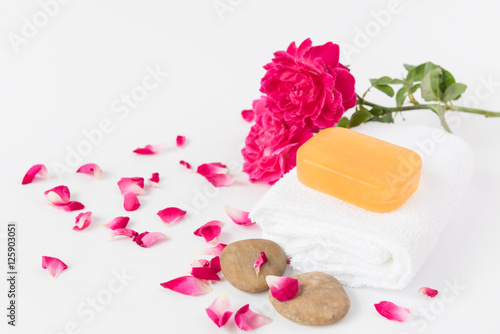 Spa concept with tamarine soap,towel,zen stone and beautiful ros