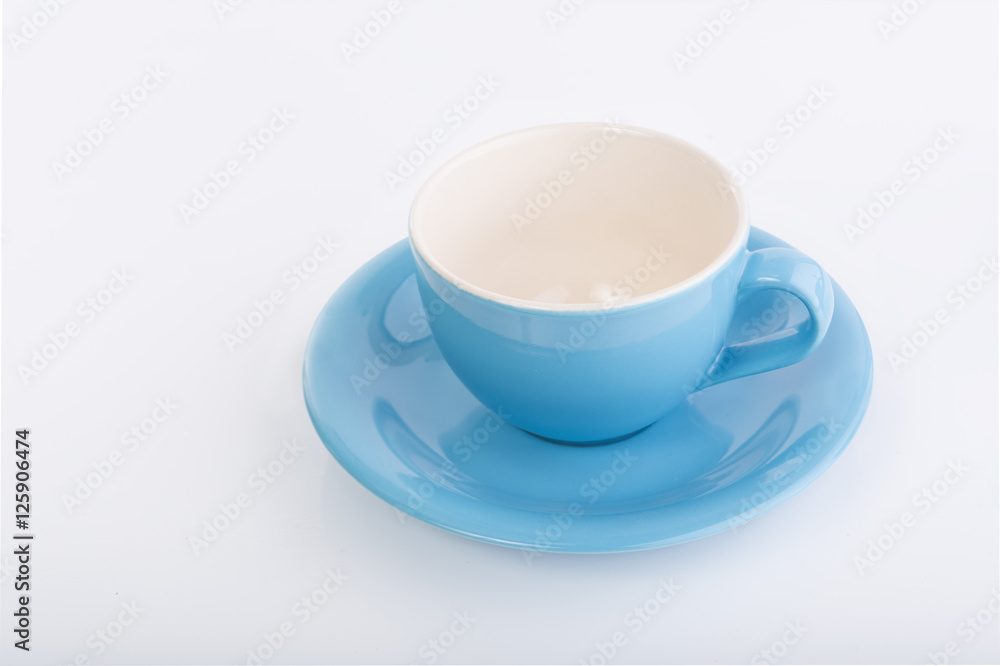 Obraz premium Blue coffee cup on white background