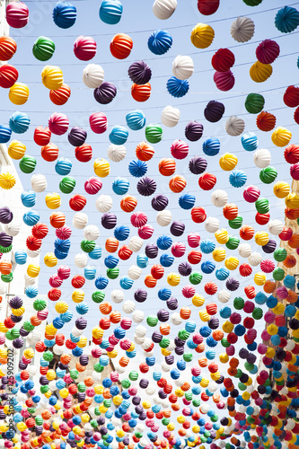 multiples guirnaldas con farolillos de colores en la feria de Málaga en España photo