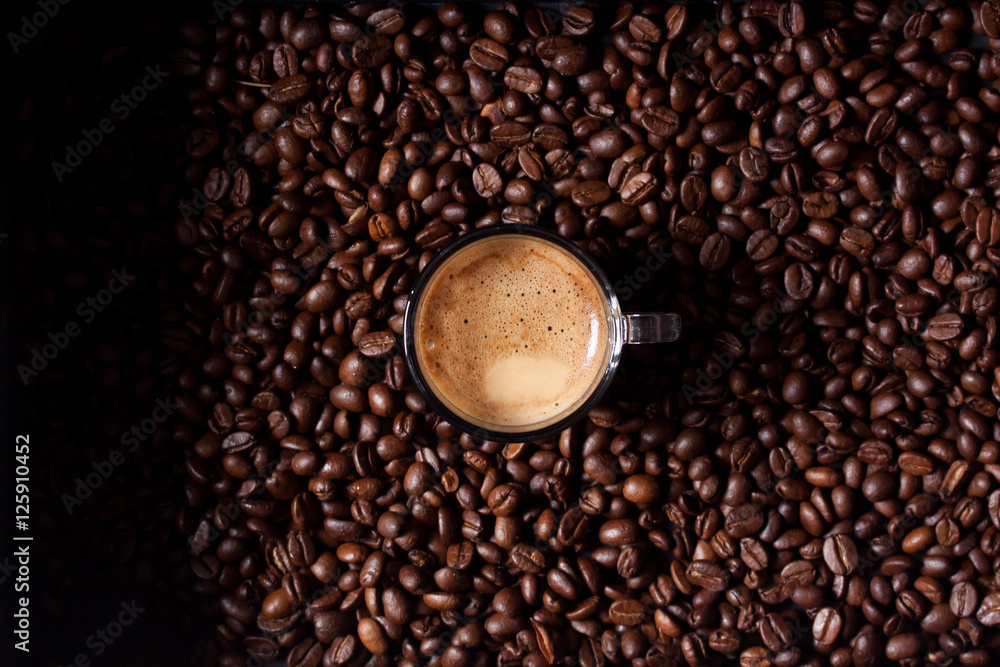 espresso coffee on coffee beans background espresso coffee on coffee beans background