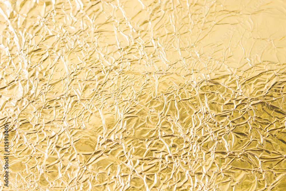 Gold wrinkled paper texture abstract background Gold wrinkled paper texture abstract background