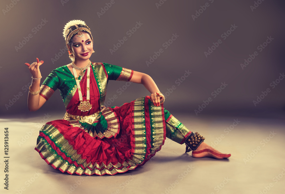 Fototapeta premium Beautiful indian girl dancer of Indian classical dance bharatanatyam . Culture and traditions of India.