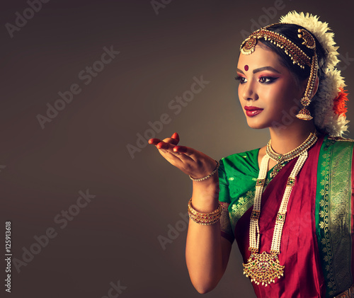 Beautiful indian girl dancer of Indian classical dance bharatanatyam . Culture and traditions of India.    