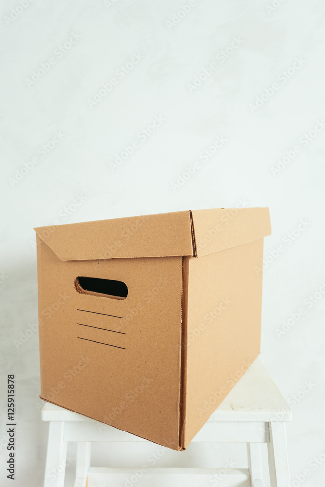 Big cardboard boxes standing insinde a room Big cardboard boxes standing insinde a room