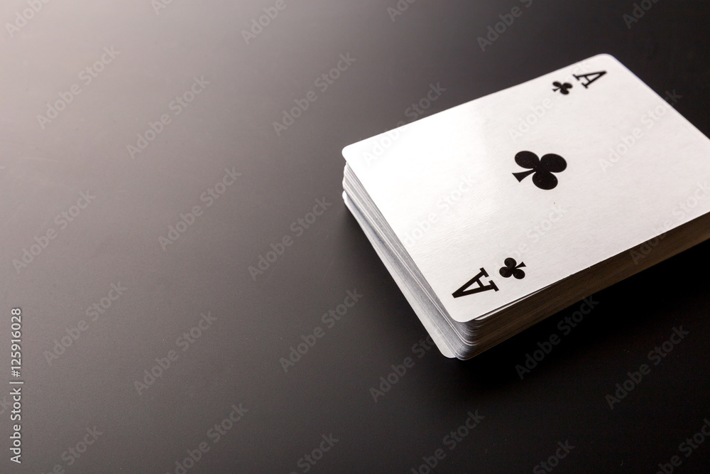 poker chips and cards on black background poker chips and cards on black background