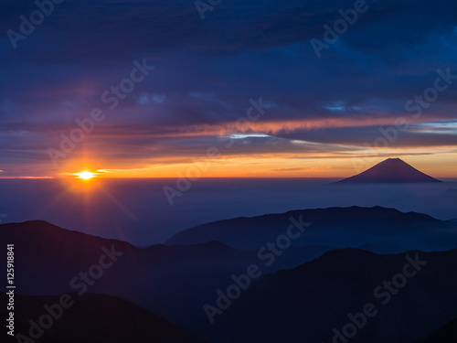 Mt.Fuji and the rising sun on Kitadake  Minami South Alps  Japan