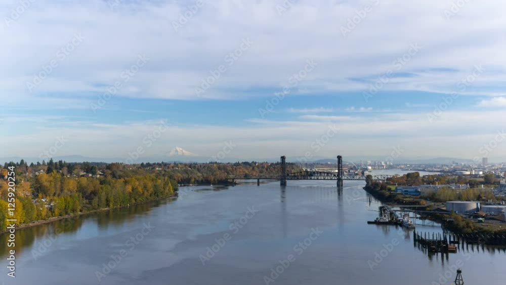 Time lapse movie of of moving clouds over industrial area with steel bridge and downtown Portland OR along Willamette River in colorful autumn fall season 4k uhd Time lapse movie of of moving clouds over industrial area with steel bridge and downtown Portland OR along Willamette River in colorful autumn fall season 4k uhd