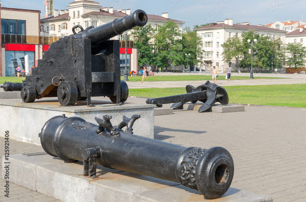 Old cannon and anchor on the Shore Promenade of Admiral Serebrya Old cannon and anchor on the Shore Promenade of Admiral Serebrya