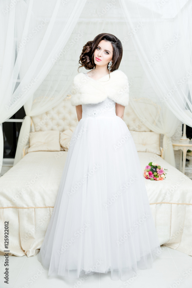 gorgeous bride in luxury wedding dress. Bride. Perfect Make up. Hairstyle, wedding jewelry. Beautiful Woman with Shiny Brown Hair. gorgeous wedding bouquet of various flowers. gorgeous bride in luxury wedding dress. Bride. Perfect Make up. Hairstyle, wedding jewelry. Beautiful Woman with Shiny Brown Hair. gorgeous wedding bouquet of various flowers.