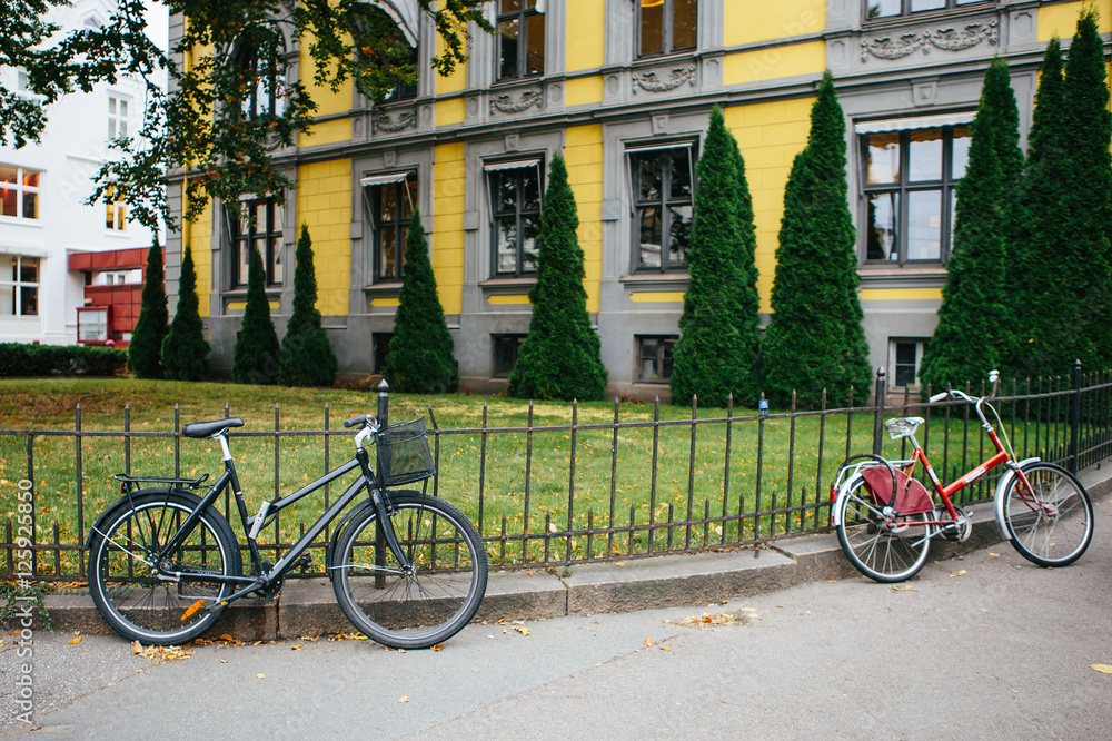 Bicycles in the park. Autumn city in Europe.