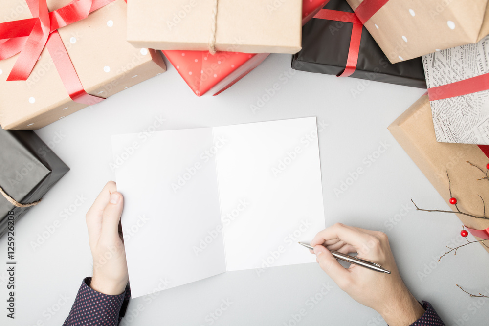Obraz premium Christmas / New Year set, hands is writing A5 Bi-fold greeting c