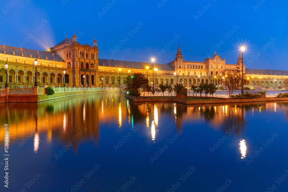 Panorama of Spain Square or Plaza de Espana in Seville at night, Andalusia, Spain