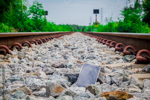 Lost Phone.The phone  dropped and fell to the railroad tracks .