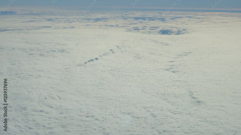 Traveling by air. View through an airplane window. Traveling by air. View through an airplane window.